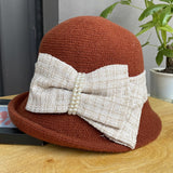 Elegant bow short brim curly small hat women's all-match knitted hat to keep warm in autumn and winter