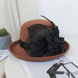 Fashion elegant bowler hat in autumn and winter Women's woolen pot hat Feather mesh flower felt hat